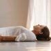 Demonstrating how progressive muscle relaxation works.